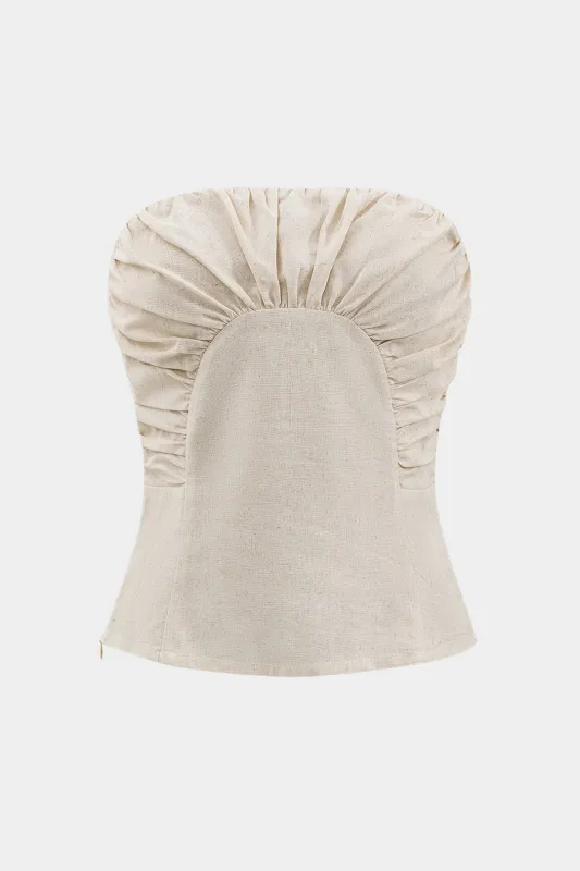 Linned ruched tube top sold by Micas