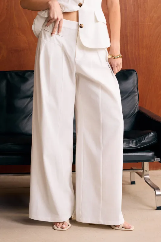 Plisserede knaplomme brede ben bukser sold by Micas