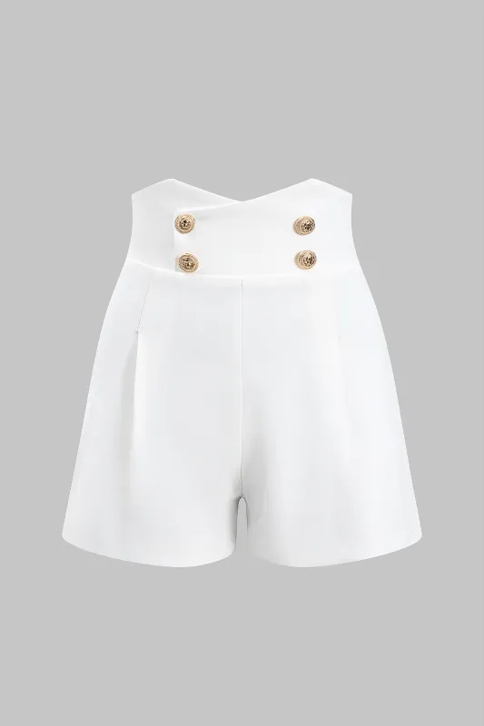 Metallisk plisseret knap lynlås shorts sold by Micas