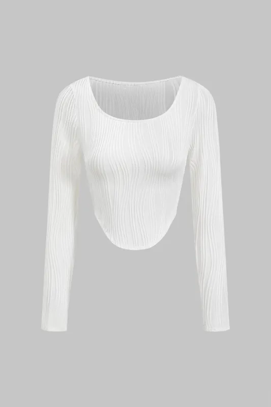 Tekstureret langærmet top sold by Micas