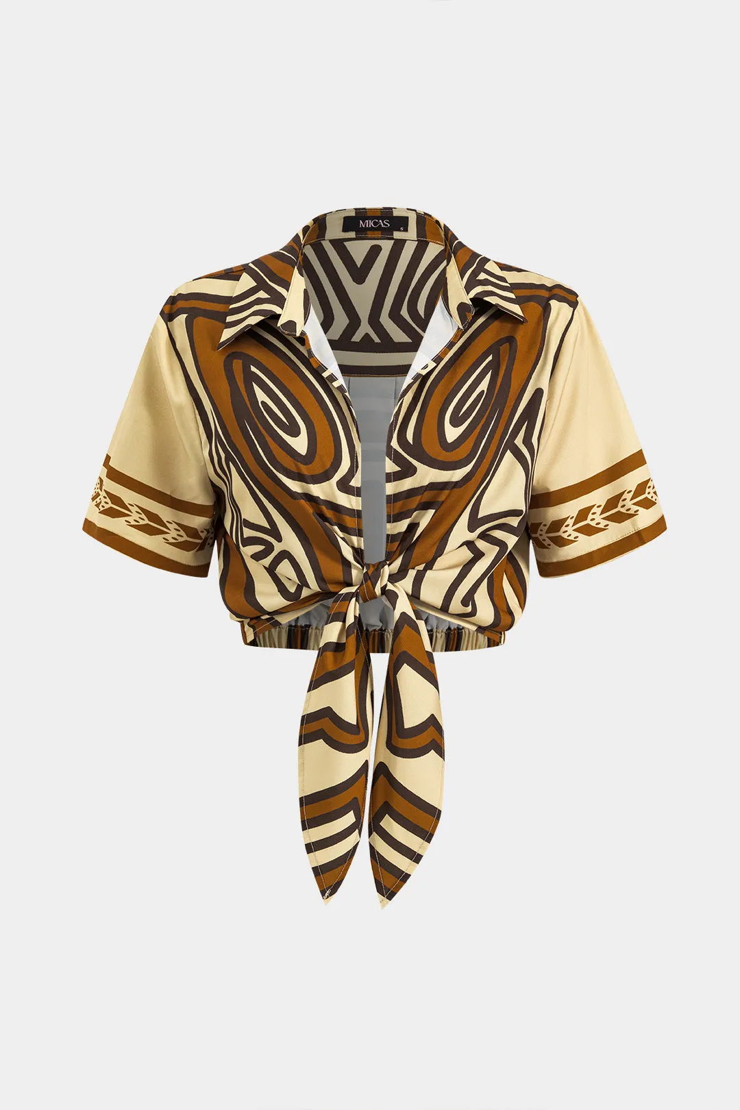 Bohemsk print slips foran kortærmet shirt sold by Micas