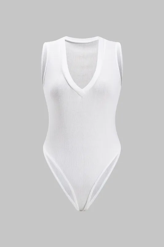 Grundlæggende solid ærmeløs bodysuit sold by Micas