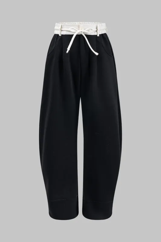 Ruched Tie Front Button Pocket Trousers sold by Micas