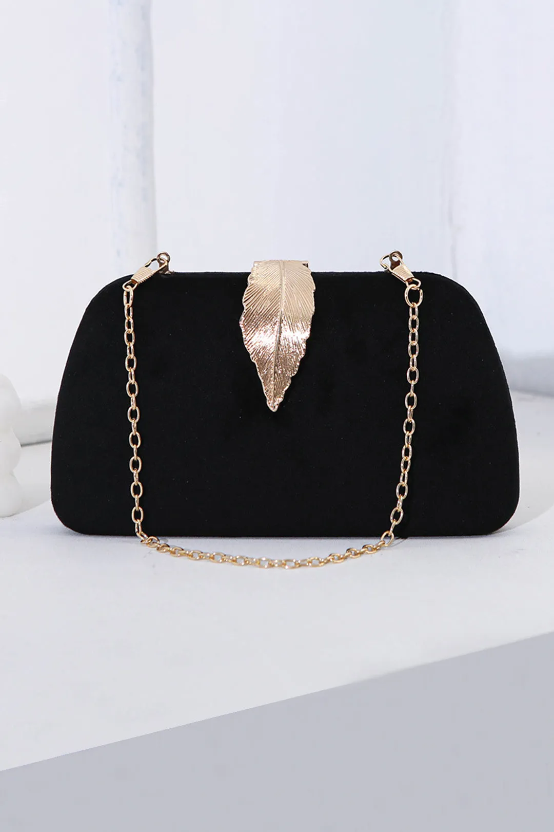 Metal Chain Leaf Decor Clutch Purse sold by Micas product image thumbnail 2