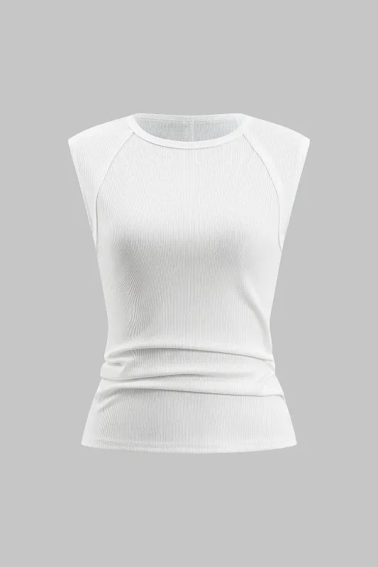 Solid tank top sold by Micas