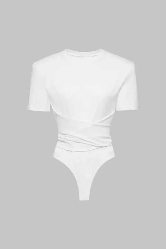 Solid kortærmet bodysuit sold by Micas