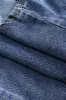 Denim -knap vest sold by Micas