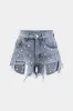 Denim høj talje perlerede shorts sold by Micas