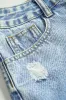 Denim vaskede knaplommehorts sold by Micas