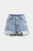 Denim vaskede knaplommehorts sold by Micas