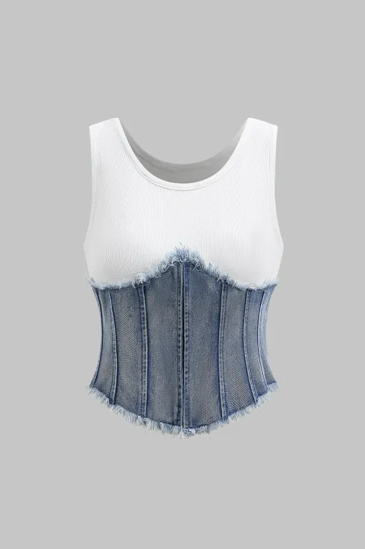 Denim patchwork tank top sold by Micas