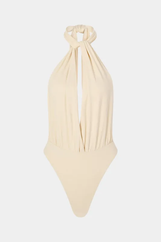 Ruched V-hals ærmeløs bodysuit sold by Micas