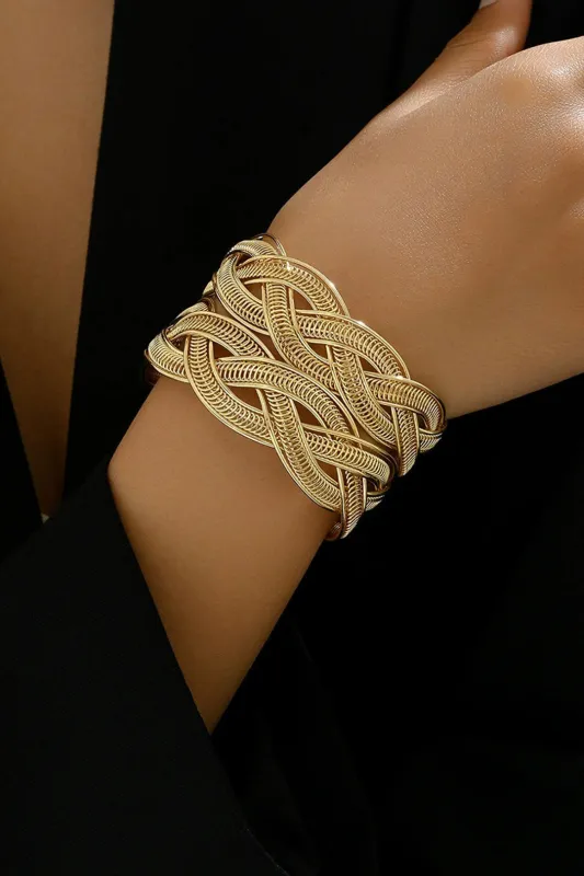 Metal overdrevet tværvævet justerbart armbånd sold by Micas