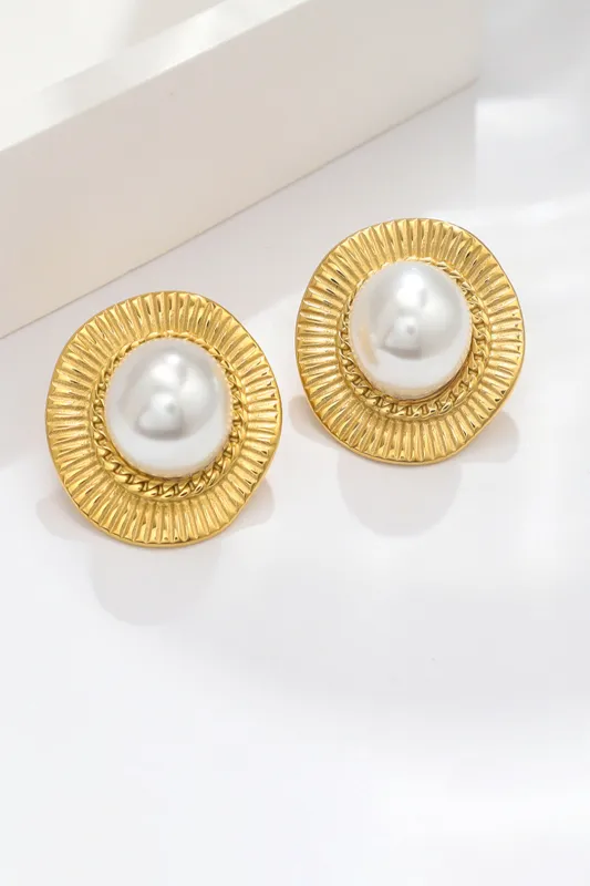 Pearl geometriske øreringe sold by Micas