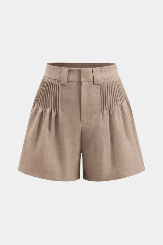 Solid plisserede shorts sold by Micas
