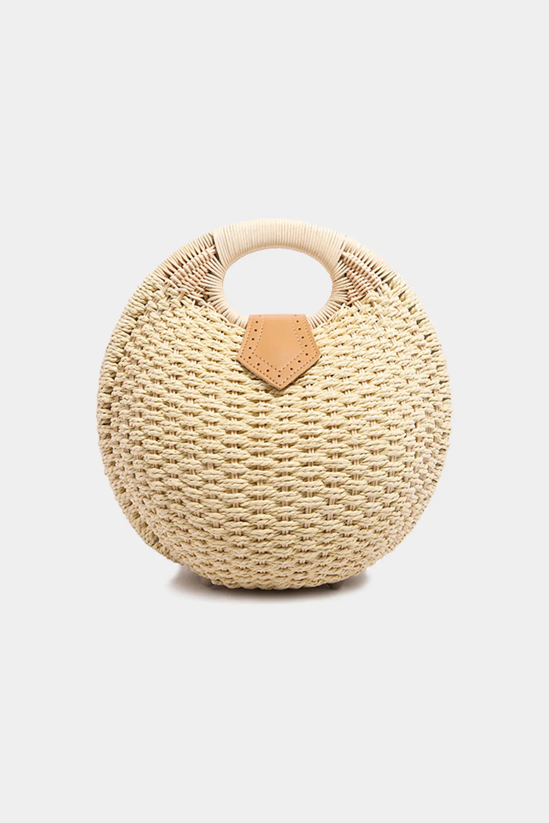 Vævet shell -taske sold by Micas