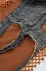 Denim hul ud patchwork tank top sold by Micas