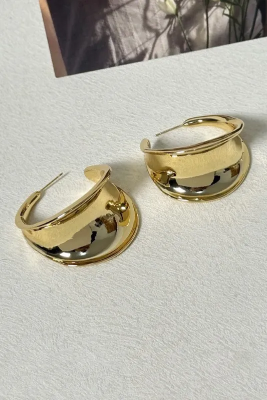 Øreringe i metal sold by Micas