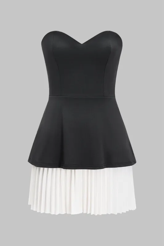 Stropløs V-hals plisset lappetwork lynlås ærmeløs bustier mini kjole sold by Micas