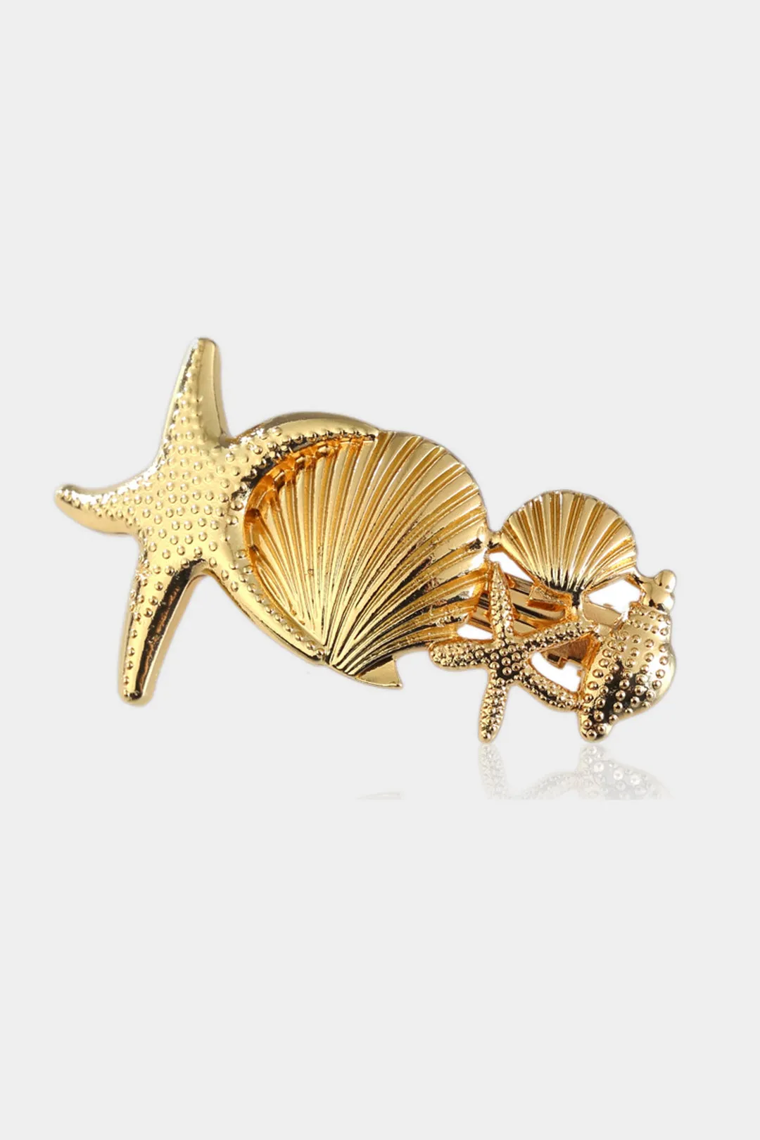 Shell Decor Hair Accessory sold by Micas