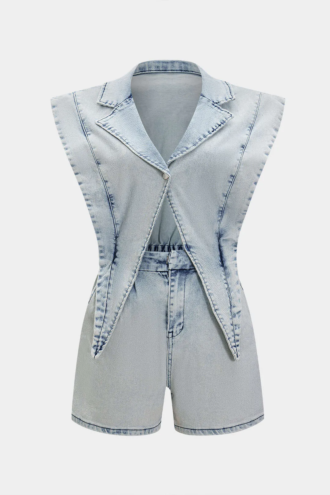 Denim v-hals udskåret jumpsuit sold by Micas