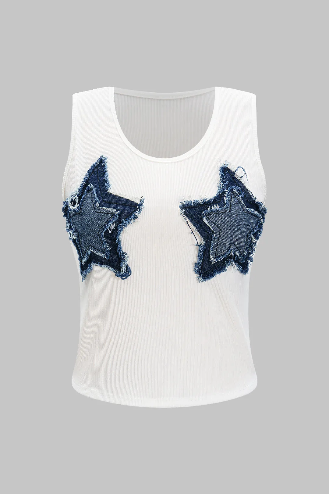 Denim patchwork tank top sold by Micas
