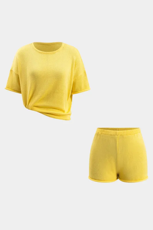 Strik solid kortærmet top og shorts sæt sold by Micas
