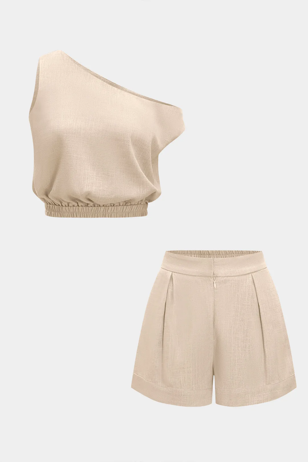 Linned asymmetrisk top og shorts sætter sold by Micas