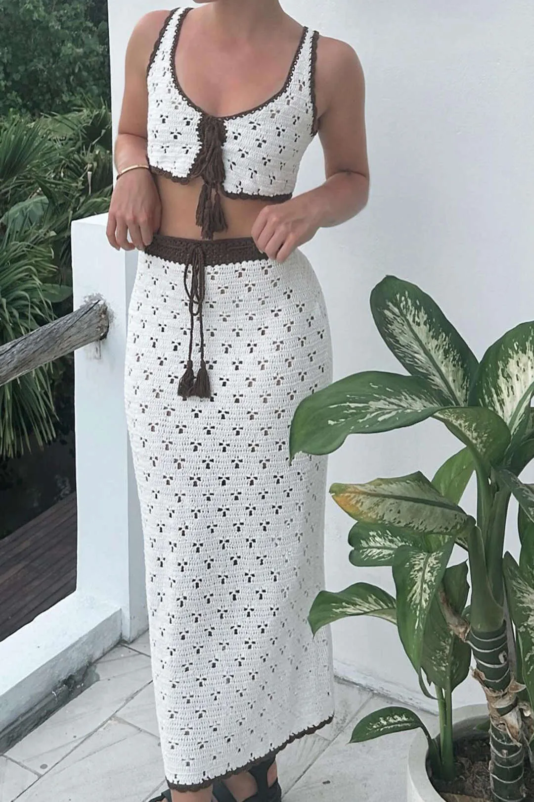 Hul ud stroppet top og nederdel sæt sold by Micas