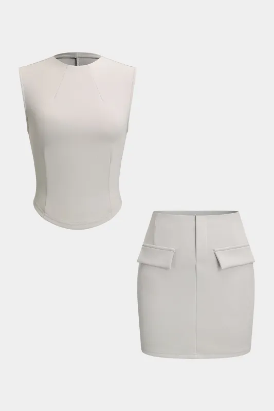 Solid vest og nederdel sold by Micas