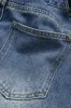 Denim asymmetriske lommehorts sold by Micas