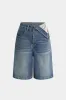 Denim asymmetriske lommehorts sold by Micas