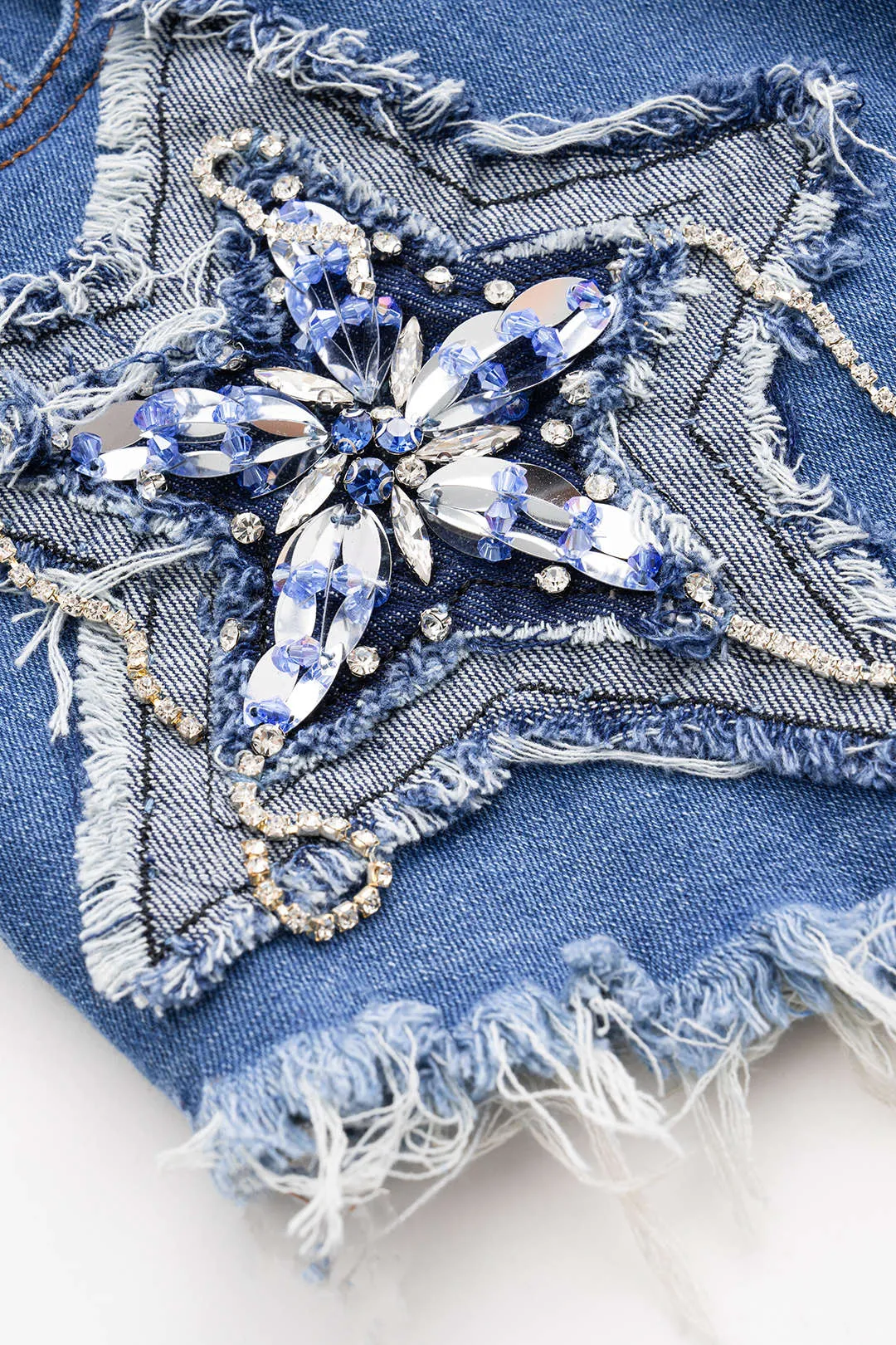 Denim rhinestone flossede low talje shorts sold by Micas product image thumbnail 3