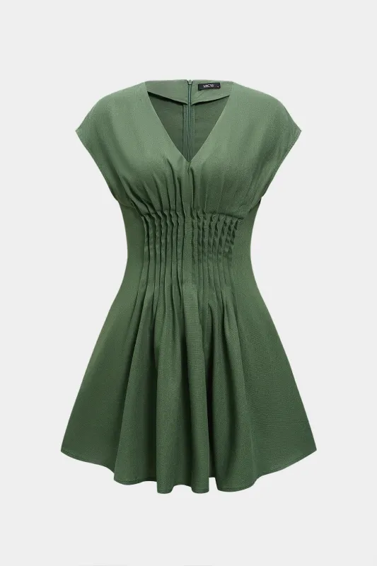 V-hals ærmeløs linned mini kjole sold by Micas