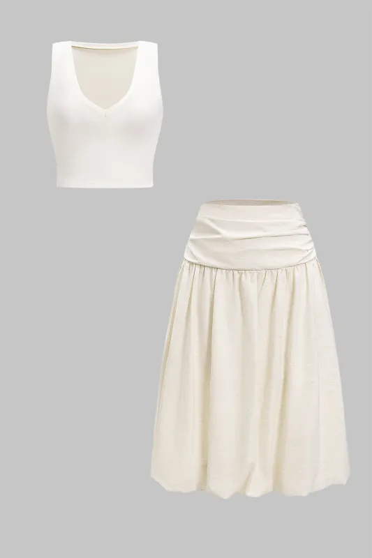 Sleeveless V-Neck Tank Top And Ruched Skirt Set sold by Micas