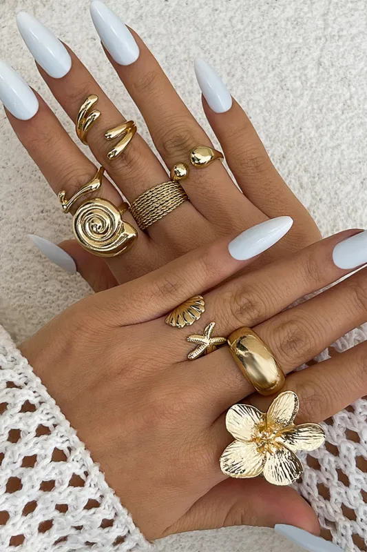 Shell Starfish Flower uregelmæssig metallisk åben ring sæt sold by Micas