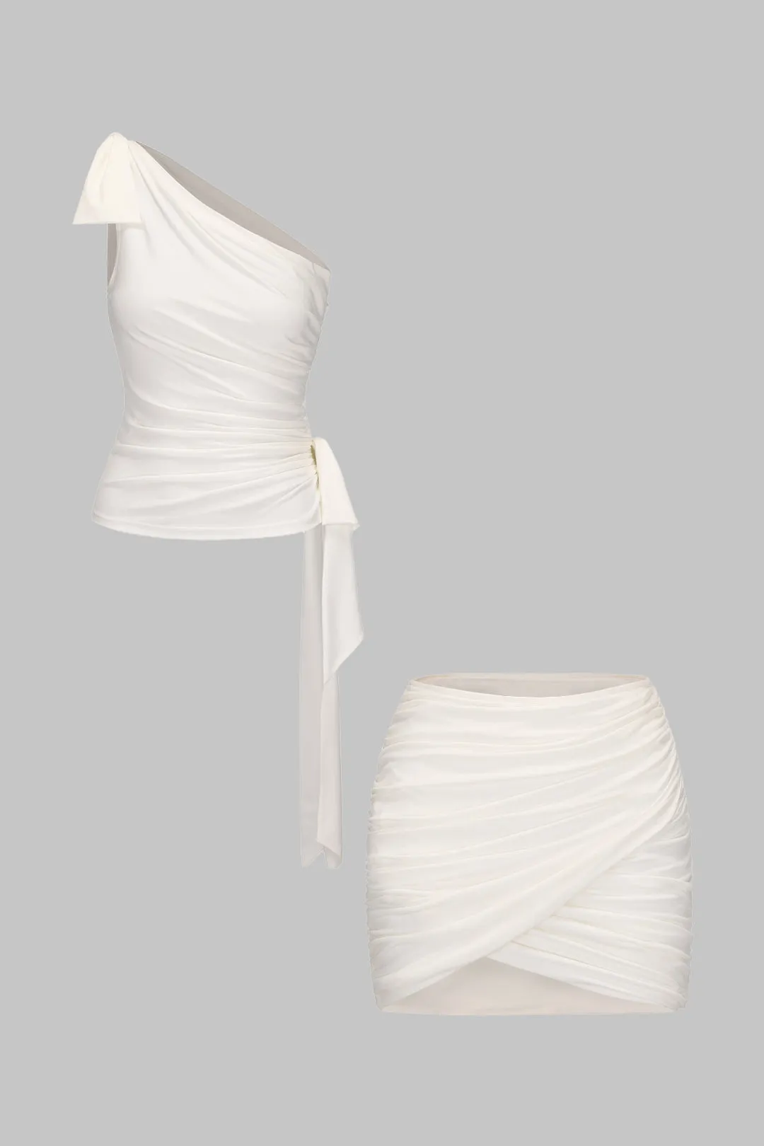 Knotet tank top og nederdel sold by Micas