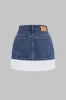 Denim asymmetrisk patchwork lynlås nederdel sold by Micas