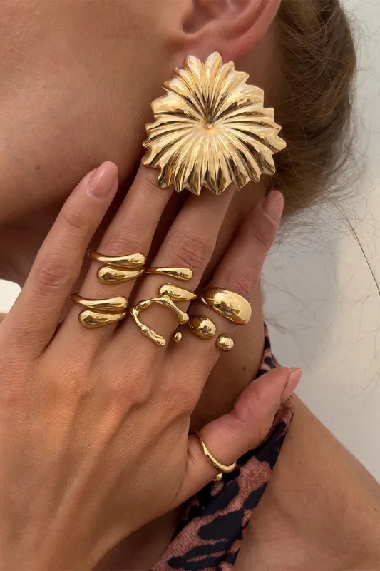Metallisk uregelmæssig ringsæt sold by Micas