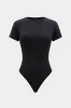 Knappet kortærmet bodysuit sold by Micas