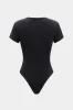 Knappet kortærmet bodysuit sold by Micas