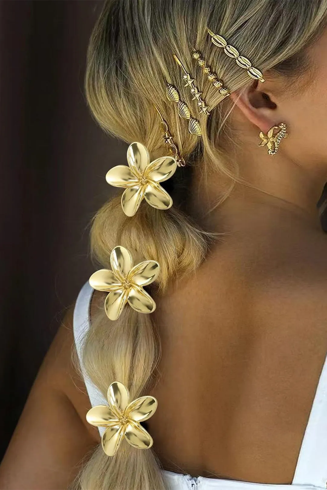 Blomsterhår tilbehør sold by Micas