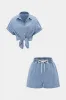 Denim knaplommetank top og tegnehorts shorts sold by Micas