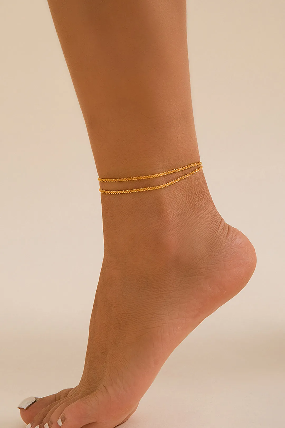 Metallisk lagdelt kvast ankel sold by Micas