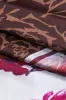 Blomsterprint V-hals patchwork langærmet top sold by Micas