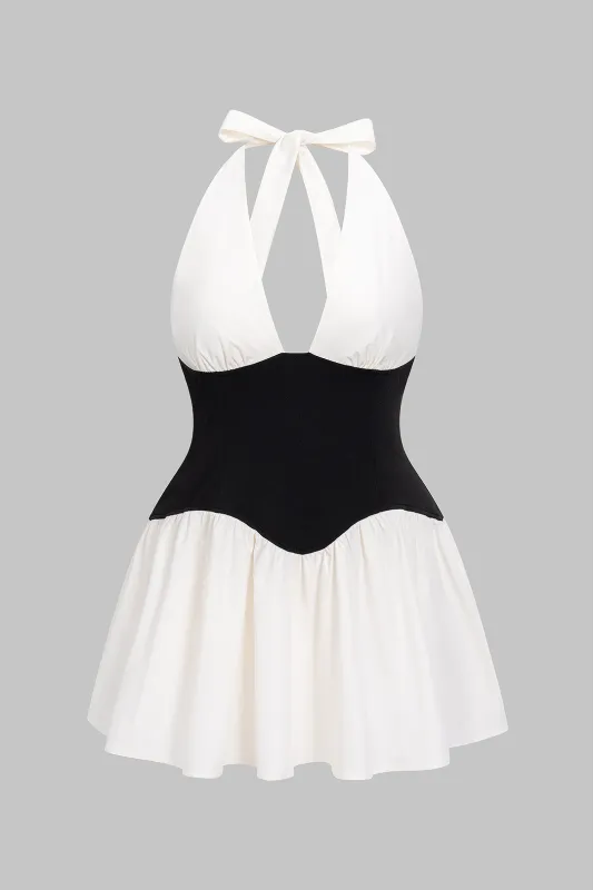 Plus størrelse halter hals patchwork ærmeløs mini kjole sold by Micas