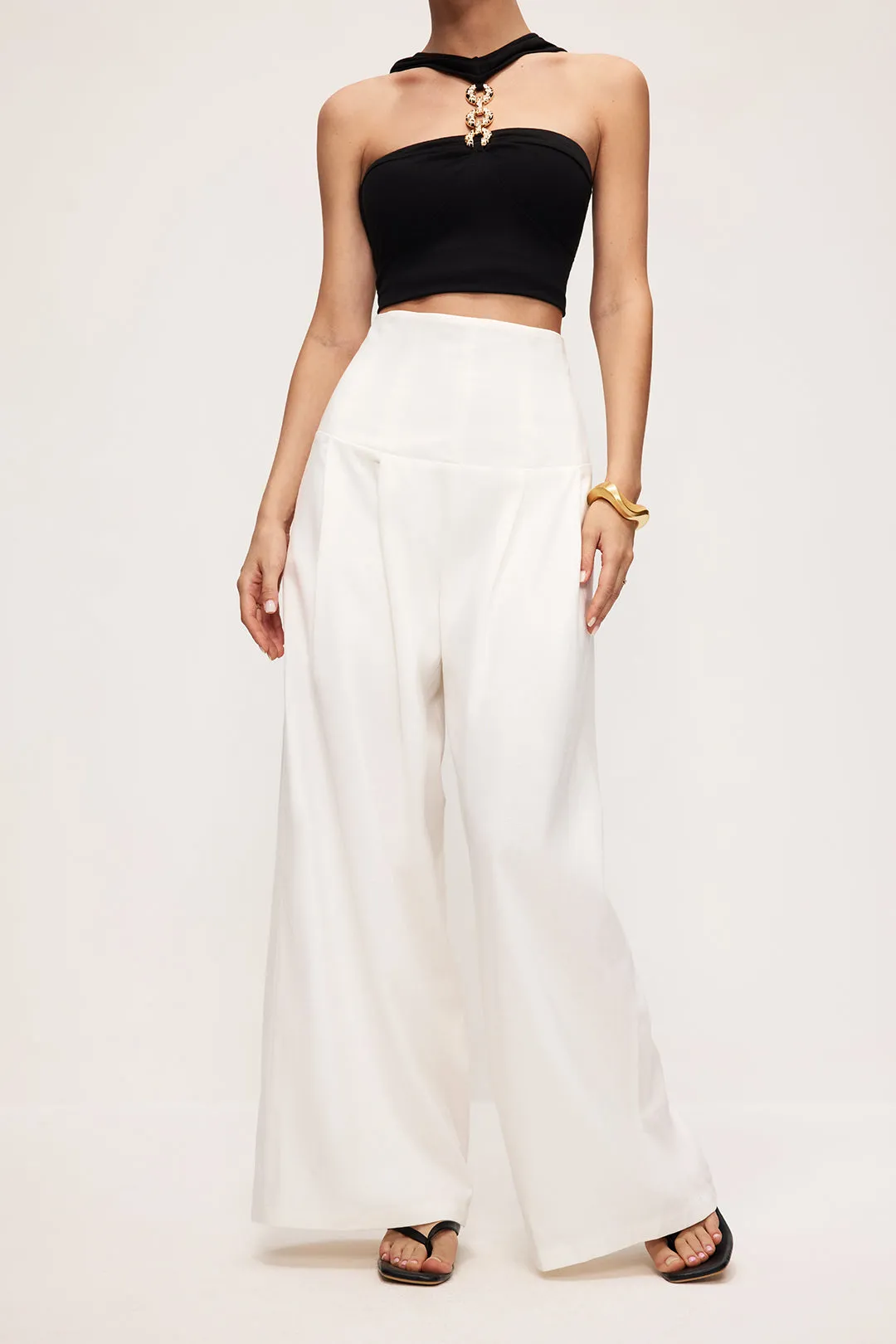 Linen Pleated Trousers sold by Micas