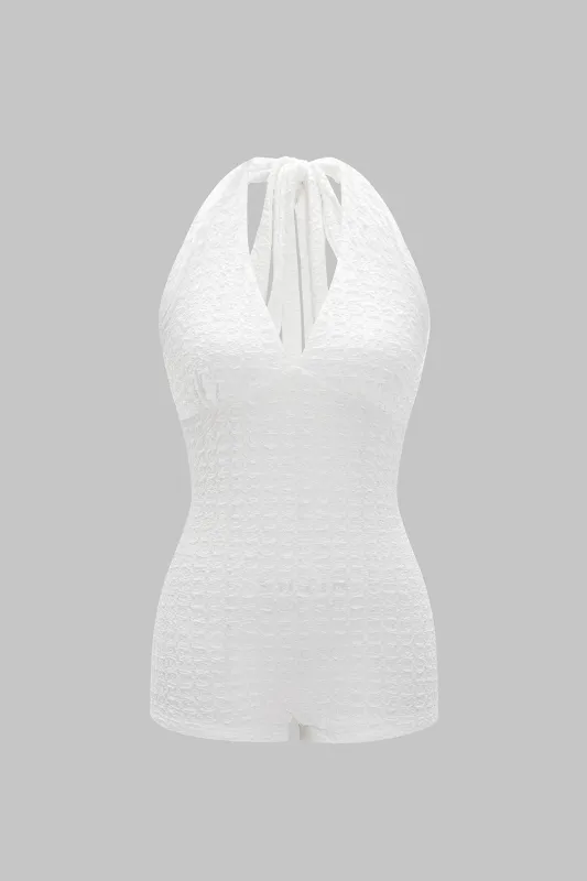 Backless Tie Back Knotted Sleeveless Romper sold by Micas