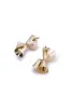 Twisted Metallic Surface Earring sold by Micas