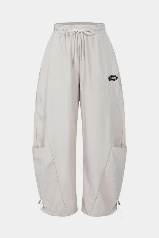 Drawstring brede benlomme tønde bukser sold by Micas